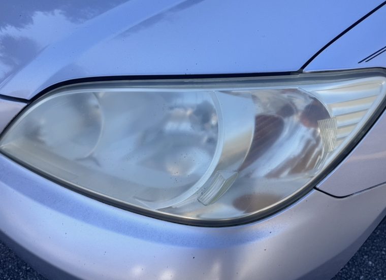 Cloudy headlight on a silver Honda Civic