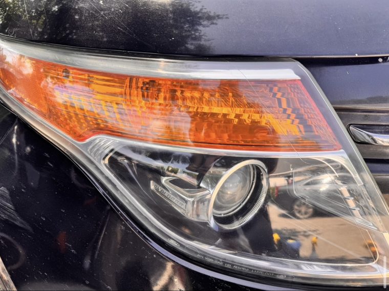 The same Explorer headlight clear with projector visible