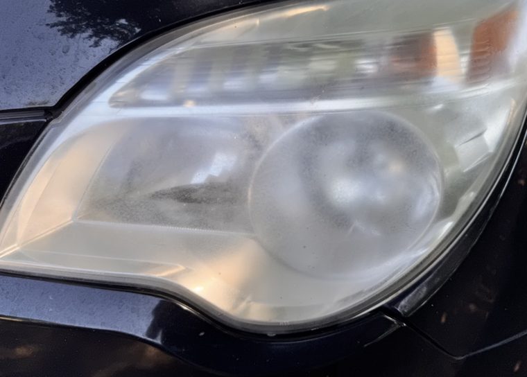 Headlight clouded to near-opaque on a vehicle in Calabash